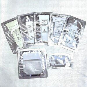 7 Sisley samples - eye and lip contour balm, cleansing milk, buffing, body cream